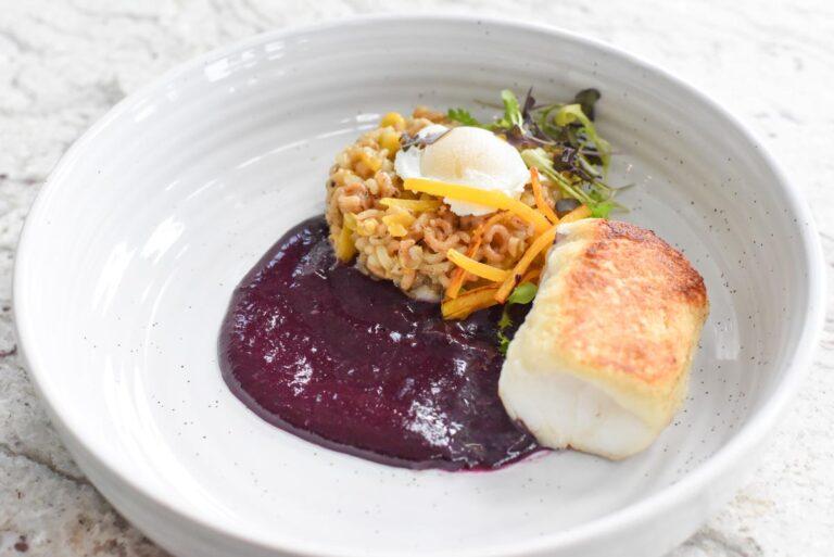 edible MAINE - Bread Skin Cod with Wild Rice, Poached Quail Egg, and Blueberry Wojape